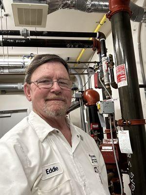 Owner working in a boiler room in a hotel