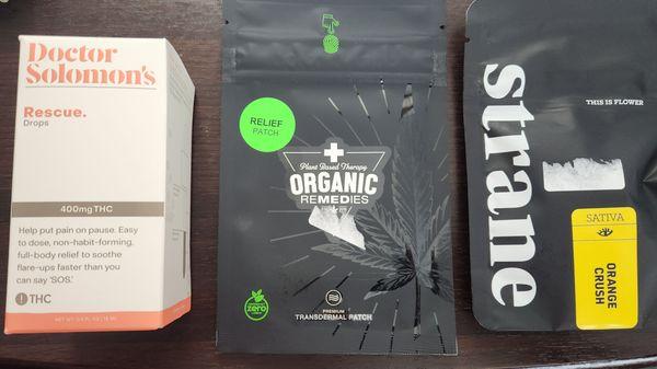 Dr. Solomon's 400mg tincture (far left), 1:1:1 transdermal pain patch 10mg CBG, 10mg CBD, 10MG THC (middle), 3.5g flower (far right)