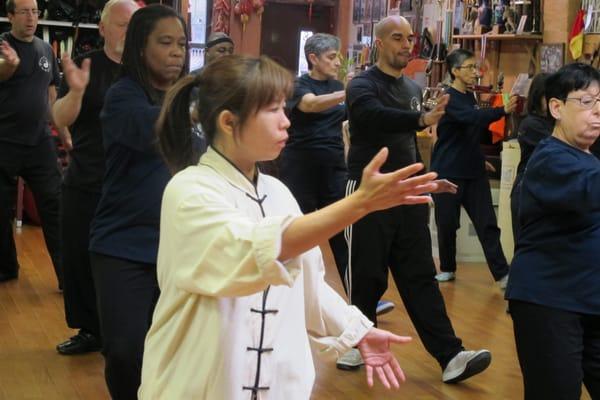 Sifu Tzyann leads the Tai Chi class