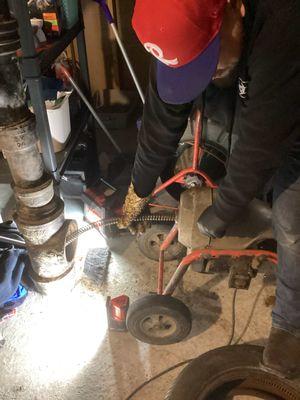 Drain cleaning services in a Chicago basement