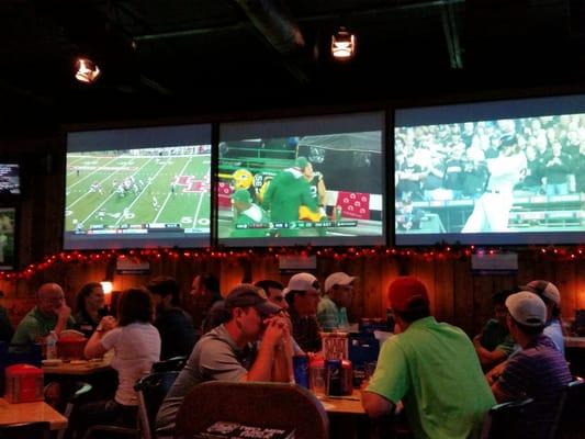 Prime Time Sports Grill has big-screen high-def flat-screens all over the place, plus individual speakers for your booth / table