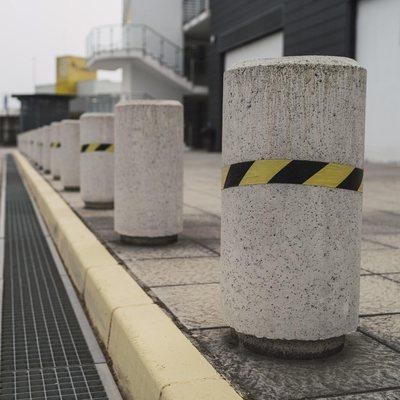 Create order and safety protocols with Cardinal Concrete's signage and bollard installation services...