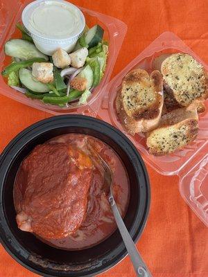 Lasagna with garlic bread and salad.