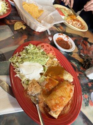 Lunch #22 Chicken chimichanga, chicken enchilada, rice & guacamole salad. $7.50 of perfection!!!