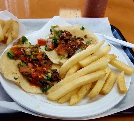 Two asada tacos and fries. Good stuff.