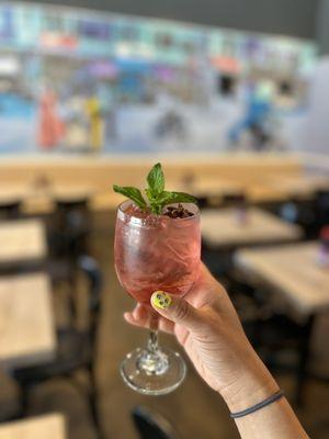 Hibiscus spritz cocktail, $3 off during happy hour