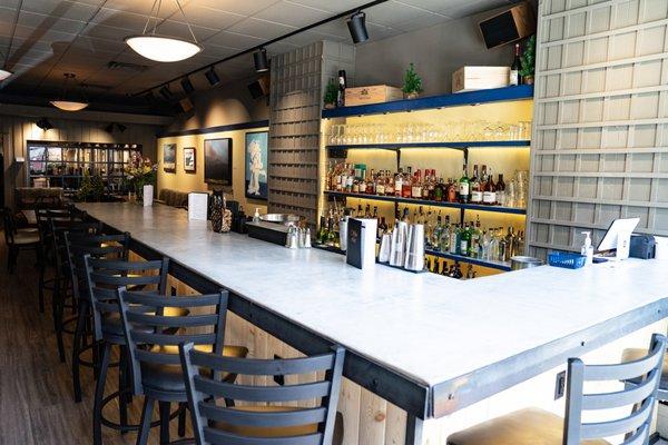 The Uptown Café now has a cozy, casual bar for meeting friends over drinks.