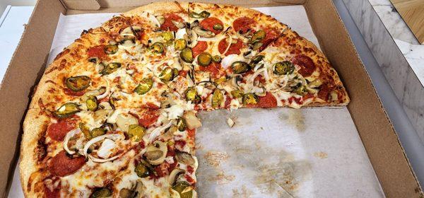 Pepperoni with pickled Jalepenos, mushroom, and onions.