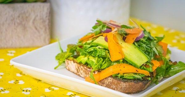 Sliced Avocado, Picked Onions, Shaved Carrots, Cucumber and Arugula