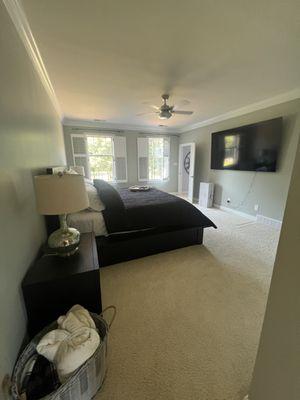 Sanded away textured ceiling to smooth and custom painted from floor trim to ceiling.