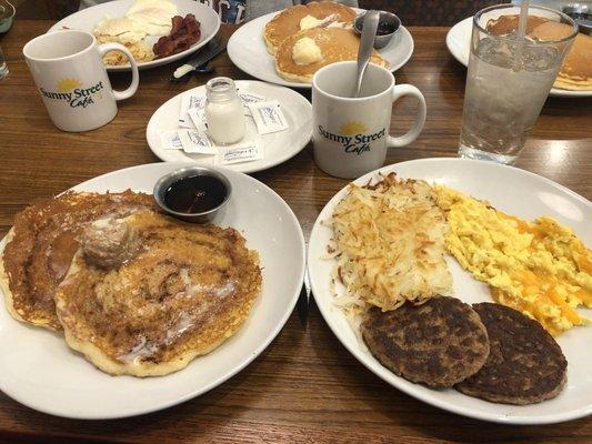 Cinnamon roll pancakes and the hearty breakfast with eggs scrambled and cheese. They have decaf coffee too!