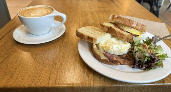 Latte and breakfast sandwich