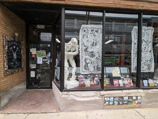 Outside view of store entrance and front window.