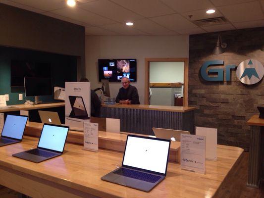 Owner Bob Mahnke in the background of Graphite's snazzy new showroom. Bob truly knows the meaning of customer service!