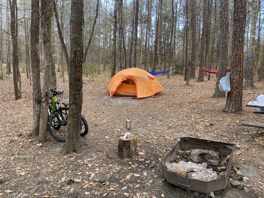 Typical campsite. This is number six site. See grill to cook food over fire and picnic table.