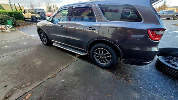 Winter tires and wheels mounted. Summer wheels ready to be bagged and loaded in back.