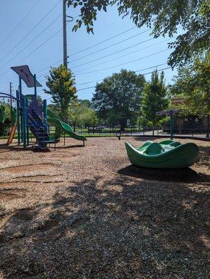 Playground with toddler and older kid play and swings with parking at Waffle House