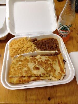 Chicken quesadilla and mandarin soda to-go. Huge portions and soo good!!