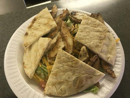 Our marinated grilled chicken salad topped with Pita bread $7.25