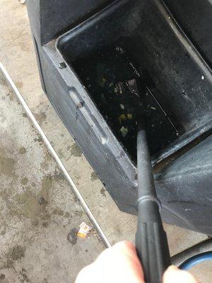 rancid and rotting items in the glass cleaner station near the fuel pump - smelly and disgusting - don't put on your windshield!