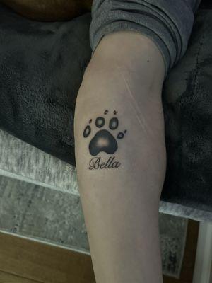 Her exact paw print on my partners arm.