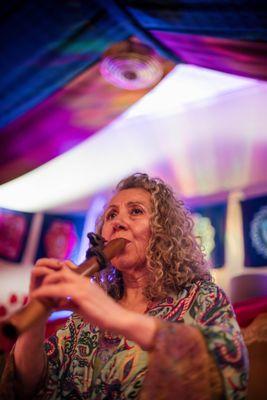 Dr. Gigi Turner playing Native American Flute during a sound bath in Colorado Springs, CO