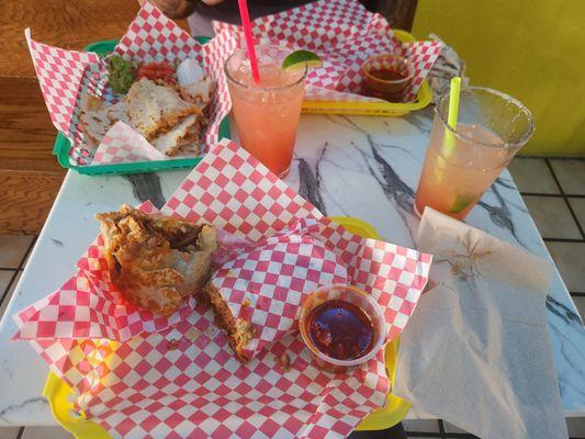 Birria burritos and strawberry margaritas