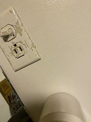 They can't spare a dollar for a new socket plate?