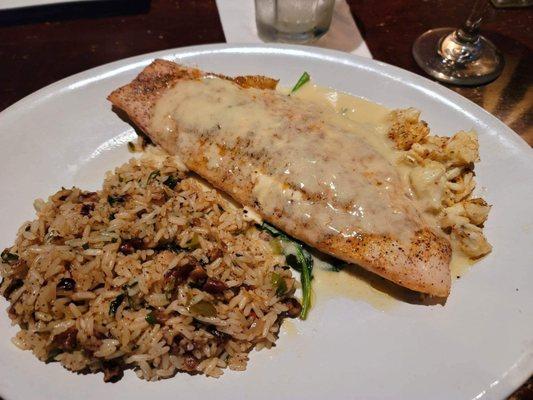 Broiled Redfish w/pecan rice and topped with limp crab meat lemon sauce