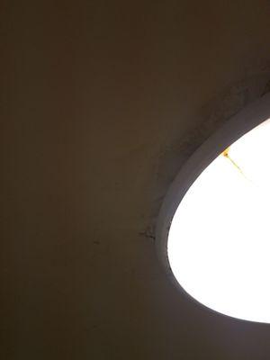 Water damage on ceiling by the light