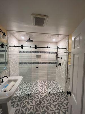 Curbless Shower with a 3/8" Titan Series Slider using Oil Rubbed Bronze Hardware & Clear Glass