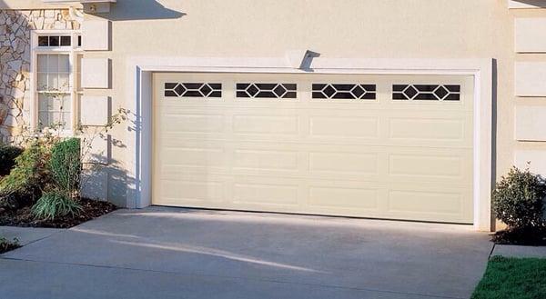 Amarr garage door installed with glass