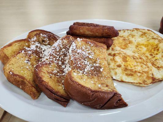 Number 4 - French toast, three eggs and four sausages.