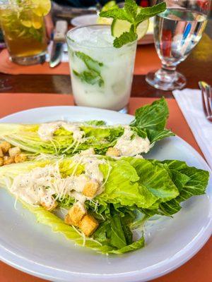 Cesar Salad. Fresh Romain Lettuce wedges and the right amount of tasty dressing.