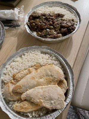 Bistec saltado and pollo al ajillo with a side of beans.