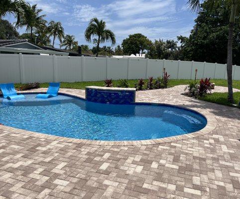 Back yard renovation including sun bench, fountain and patio tiki extension.