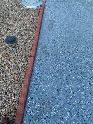 Footprints left on our newly coated driveway