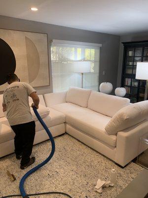 Cleaning a sofa sectional and applying  A scotchguard protector