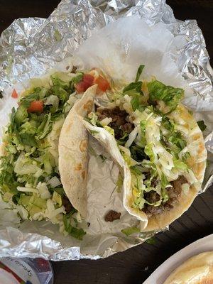 2 flour Steak Tacos with added cilantro and onions