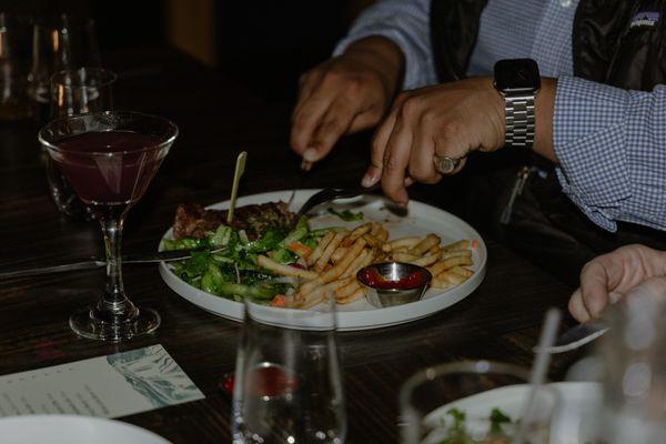 Steak frites and a cocktail?! Sounds like the perfect pair.