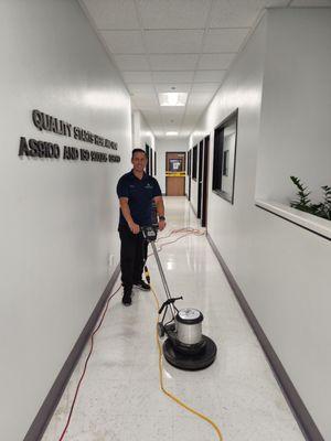 Bryan on a 4000 square foot strip and wax project in the city of Orange.