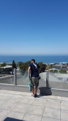 Cleaning the residential glass deck