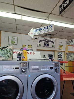 Dryers on both sides of the establishment are also a few places for sitting while you wait