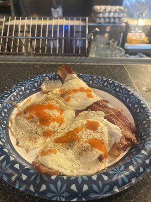 Eggs bacon hot sauce