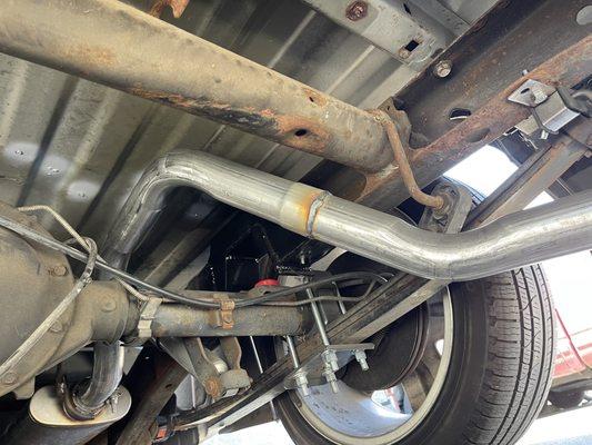 Custom tail pipe tucked up high & tight, exhaust drone is gone!