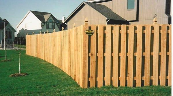 6 foot Shadow Box fence with dog eared pickets and French Gothic post.