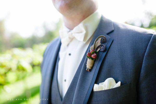 Boutonniere....out of the box! Fern shoots and hypericum...something different makes for something new!