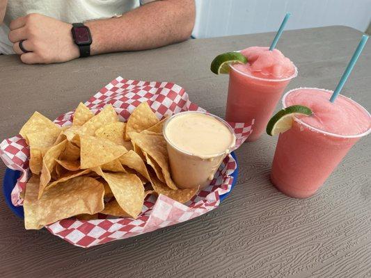 Chips and queso. 2 strawberry margaritas