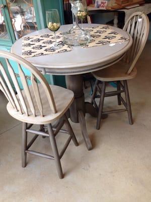 This tall cafe table and chairs are partially painted rich brown, like leather. Lovely! $325!