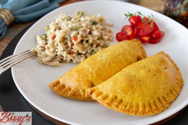 Curry Meatpie paired with a side of rice